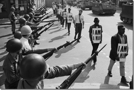 US National Guard troops block off Beale Street as Civil Rights marchers pass by on March 29, 1968.